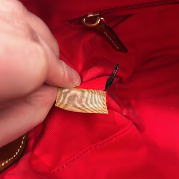 Great Condition Dooney & Bourke Black/Tan Bag w/ Atrap and dust bag - Picture 10 of 11